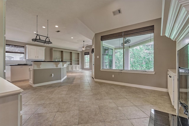 145 W Shore Dr, Montgomery, TX 77356 - kitchen featuring ceiling fan, light tile patterned floors, baseboards, and recessed lighting
