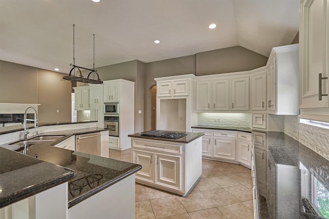 145 W Shore Dr, Montgomery, TX 77356 - kitchen with a large island, stainless steel appliances, backsplash, a sink, and recessed lighting