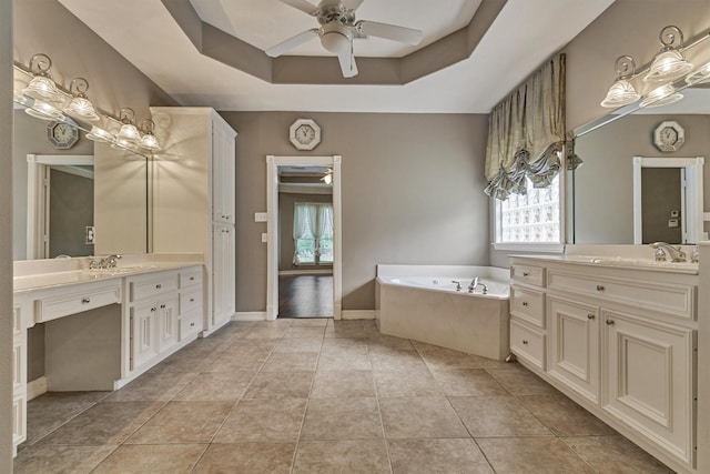 145 W Shore Dr, Montgomery, TX 77356 - full bath with plenty of natural light, ceiling fan, two vanities, and a garden tub