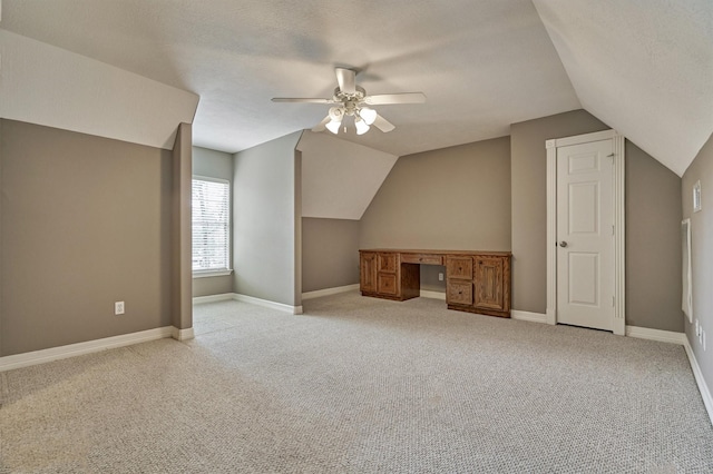145 W Shore Dr, Montgomery, TX 77356 - bonus room featuring a ceiling fan, light carpet, lofted ceiling, an office area, and baseboards