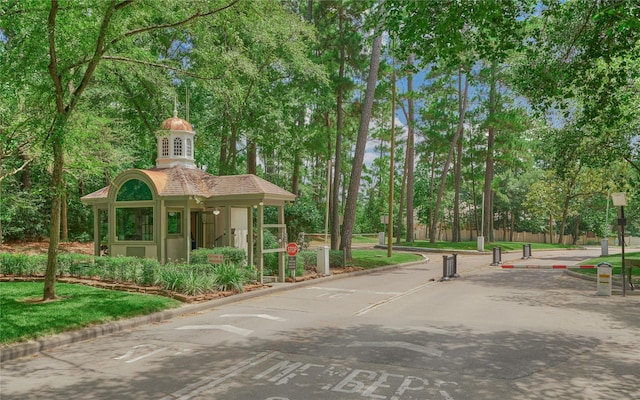 145 W Shore Dr, Montgomery, TX 77356 - view of home's community featuring view of scattered trees and uncovered parking