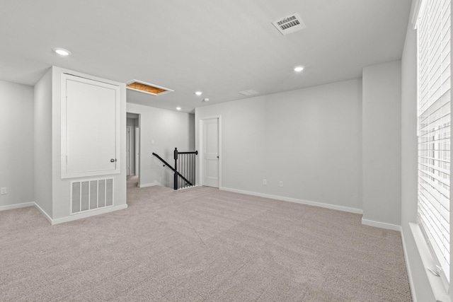 5803 Grantgrala Dr, Katy, TX 77493 - spare room featuring recessed lighting, light colored carpet, baseboards, and attic access