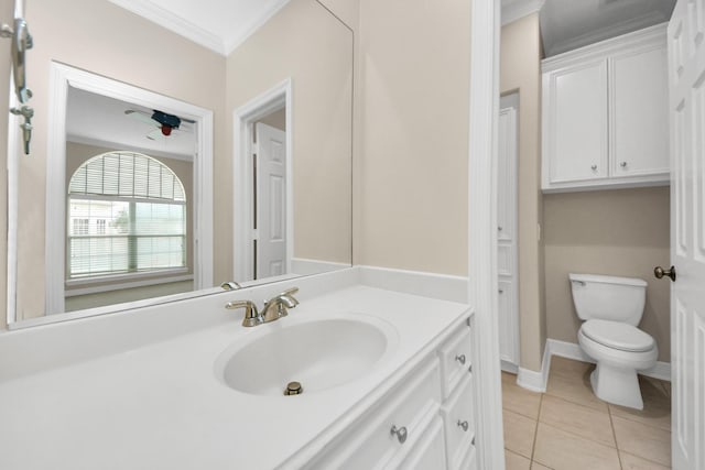 13523 Broadmeadow Ln, Houston, TX 77077 - bathroom featuring crown molding, toilet, vanity, tile patterned flooring, and baseboards