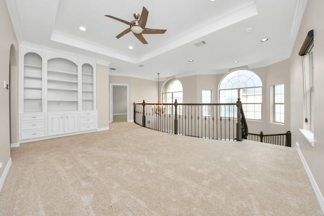 13523 Broadmeadow Ln, Houston, TX 77077 - empty room with a ceiling fan, a tray ceiling, carpet flooring, ornamental molding, and recessed lighting