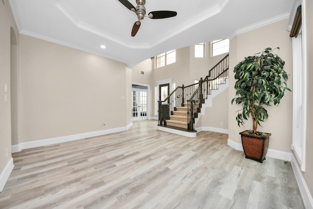 13523 Broadmeadow Ln, Houston, TX 77077 - foyer featuring a raised ceiling, arched walkways, healthy amount of natural light, ceiling fan, and recessed lighting