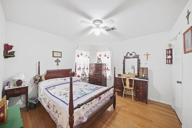 836 Sycamore St, Lake Jackson, TX 77566 - bedroom with hardwood / wood-style floors and a ceiling fan