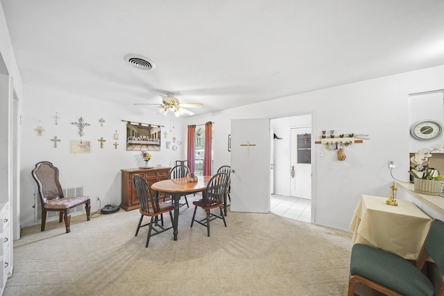 836 Sycamore St, Lake Jackson, TX 77566 - dining room featuring light colored carpet and a ceiling fan