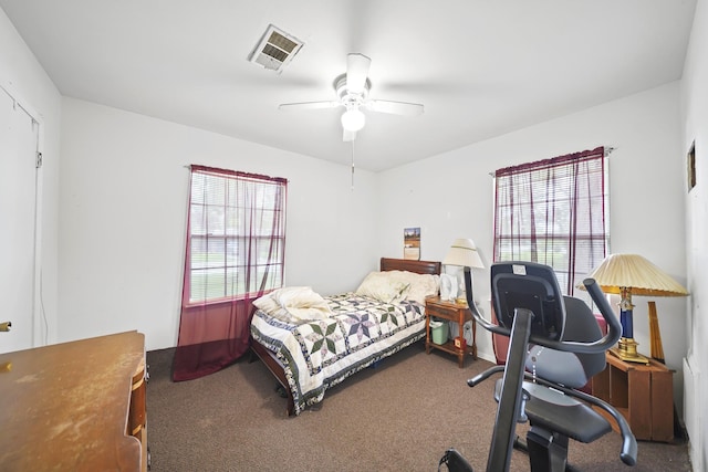 836 Sycamore St, Lake Jackson, TX 77566 - carpeted bedroom with a ceiling fan