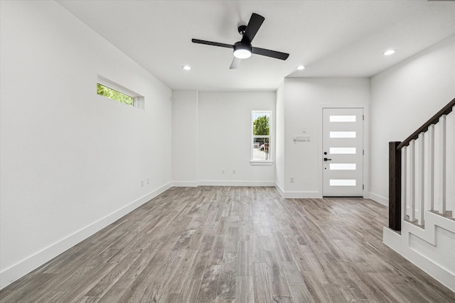 990-992 Marjorie St, Houston, TX 77088 - foyer with stairway, wood finished floors, recessed lighting, and baseboards