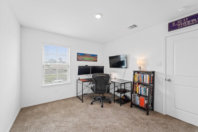 office area featuring carpet floors and baseboards