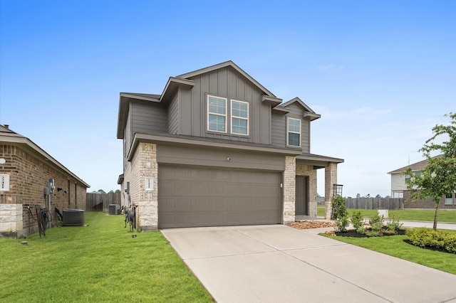 view of front of property with board and batten siding, stone siding, an attached garage, driveway, and cooling unit