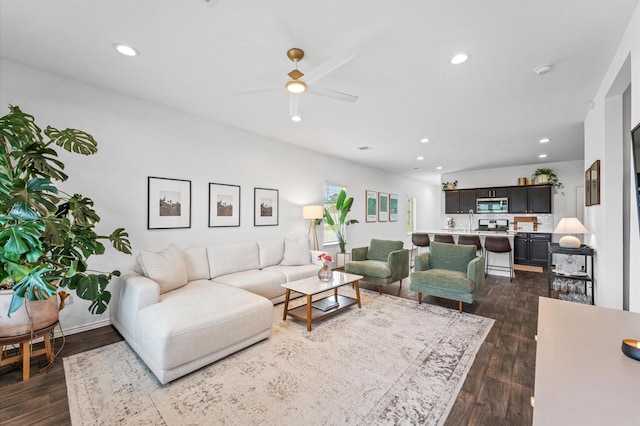 living room featuring dark wood-style floors, recessed lighting, and a ceiling fan