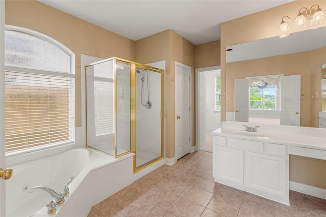 6318 Goodlowe Park, Sugar Land, TX 77479 - full bathroom with a shower stall, a whirlpool tub, vanity, and tile patterned floors