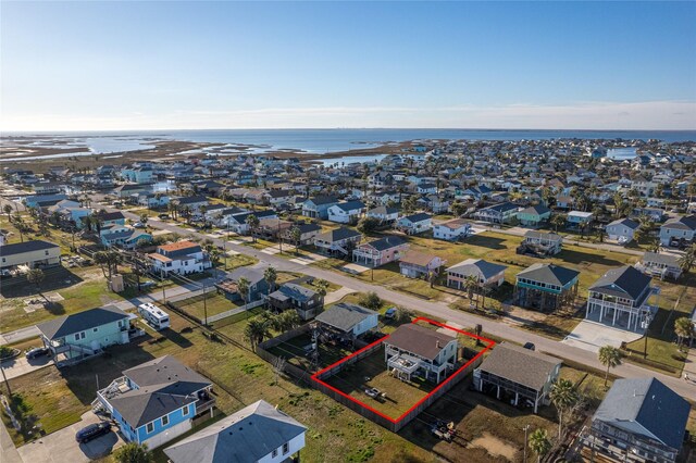 16535 Jamaica Inn Rd, Jamaica Beach, TX 77554 - aerial view of residential area featuring property parcel outlined and a nearby body of water