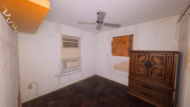 empty room with a ceiling fan, baseboards, and cooling unit