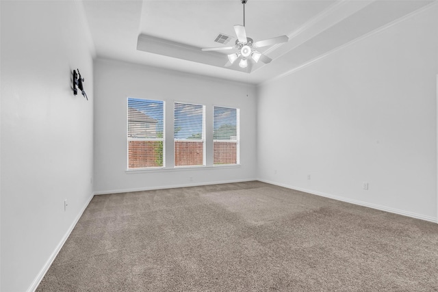 3031 Clover Trace Dr, Spring, TX 77386 - carpeted empty room featuring a raised ceiling, ceiling fan, and baseboards