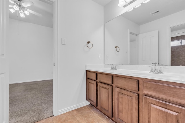 3031 Clover Trace Dr, Spring, TX 77386 - full bathroom featuring double vanity, a ceiling fan, baseboards, and tile patterned floors