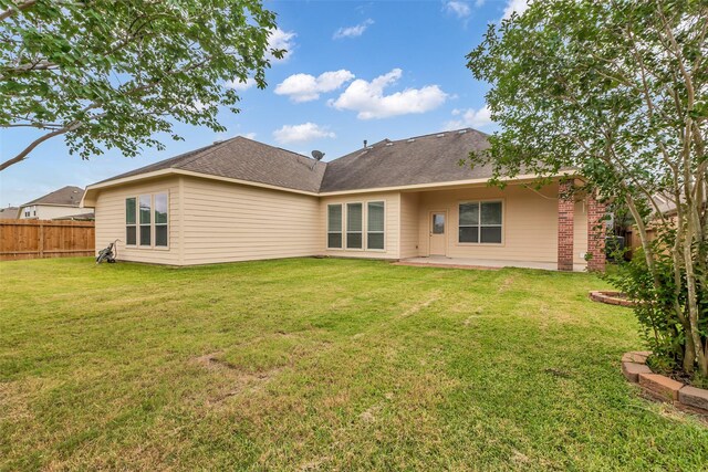 3031 Clover Trace Dr, Spring, TX 77386 - rear view of house featuring a patio area and brick siding