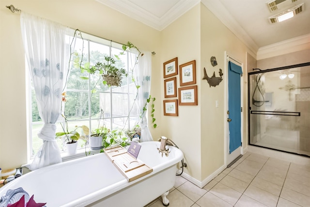 57 Atascosita Trl, Dayton, TX 77535 - full bathroom with ornamental molding, a soaking tub, a stall shower, tile patterned flooring, and baseboards