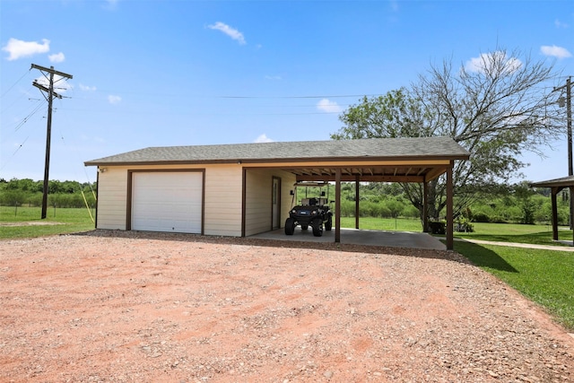 999 Salem Rd, Brenham, TX 77833 - garage featuring dirt driveway and a garage
