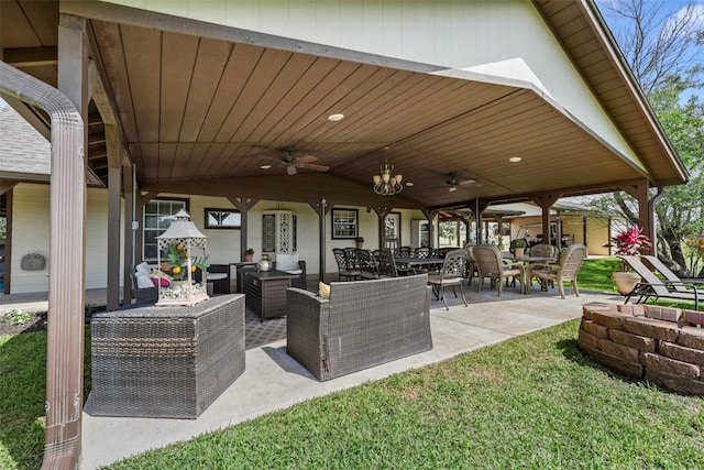 999 Salem Rd, Brenham, TX 77833 - view of patio / terrace featuring an outdoor living space, a ceiling fan, and outdoor dining space