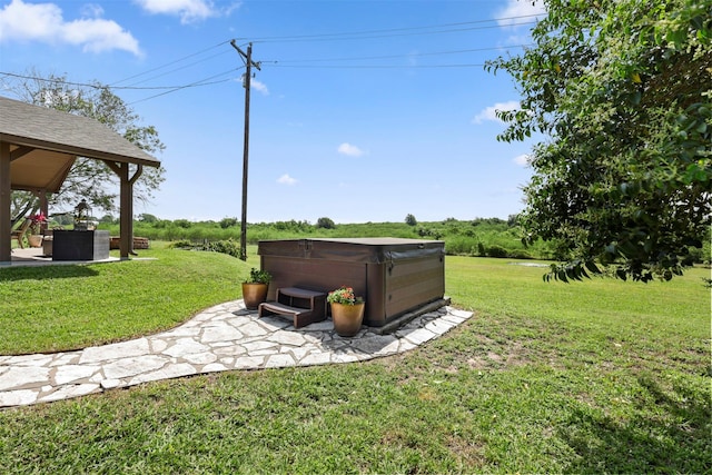 999 Salem Rd, Brenham, TX 77833 - view of green lawn featuring a hot tub and a patio area