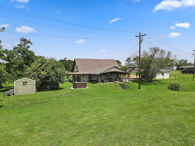 999 Salem Rd, Brenham, TX 77833 - view of grassy yard featuring an outbuilding and a hot tub