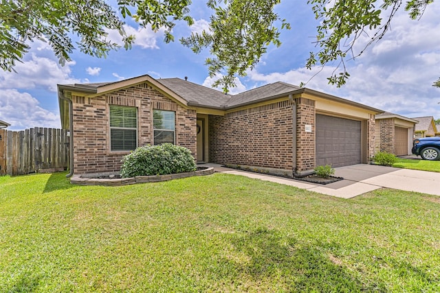 5212 Mcgrath Dr, Alvin, TX 77511 - ranch-style house with brick siding, an attached garage, and concrete driveway