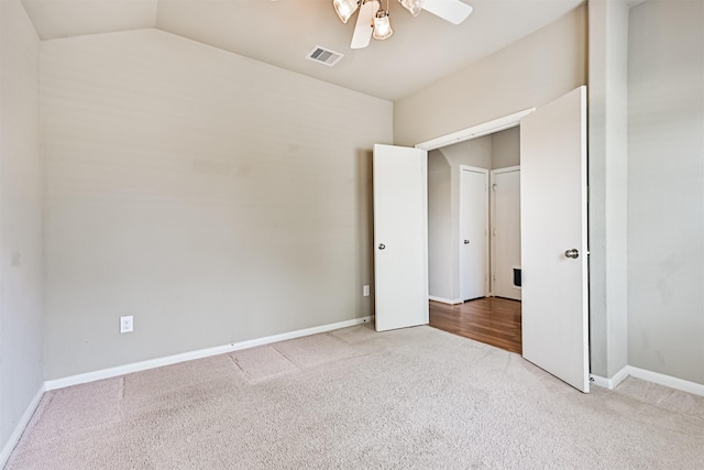 5212 Mcgrath Dr, Alvin, TX 77511 - unfurnished bedroom featuring carpet flooring, lofted ceiling, and baseboards