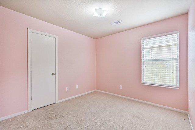 5212 Mcgrath Dr, Alvin, TX 77511 - carpeted spare room with baseboards