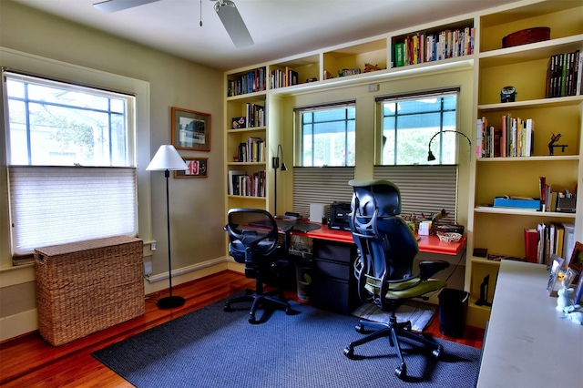 1119 E 7th 1/2 St, Houston, TX 77009 - office area featuring ceiling fan, wood finished floors, and baseboards
