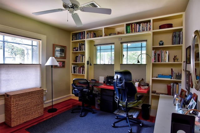 1119 E 7th 1/2 St, Houston, TX 77009 - office area featuring plenty of natural light, wood finished floors, and a ceiling fan