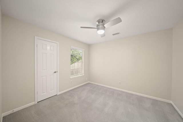8602 Canyon Pine Dr, Spring, TX 77379 - empty room with carpet floors, baseboards, and a ceiling fan