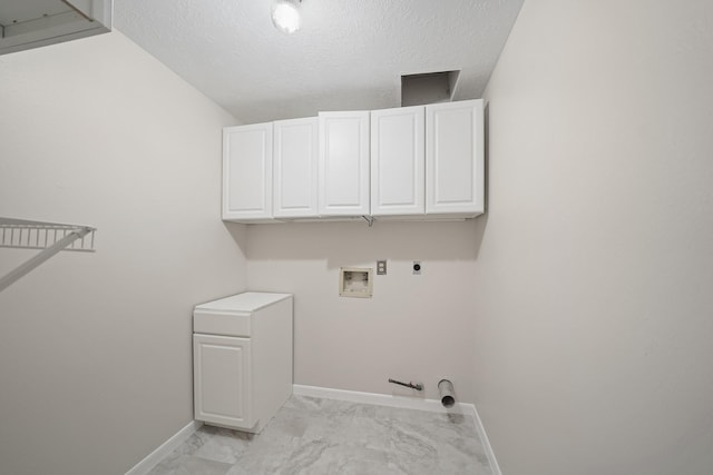 8602 Canyon Pine Dr, Spring, TX 77379 - laundry room featuring hookup for a gas dryer, hookup for an electric dryer, washer hookup, baseboards, and light marble finish flooring