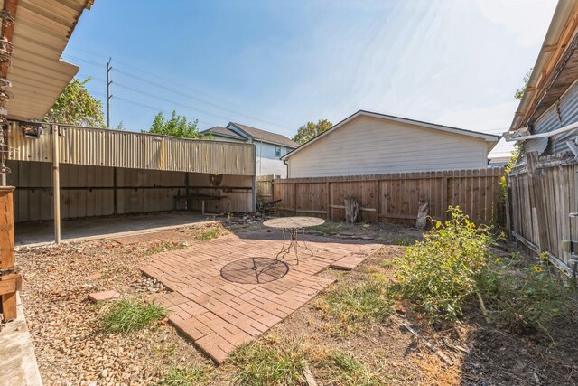 2009 Chestnut St, Houston, TX 77009 - fenced backyard featuring a patio