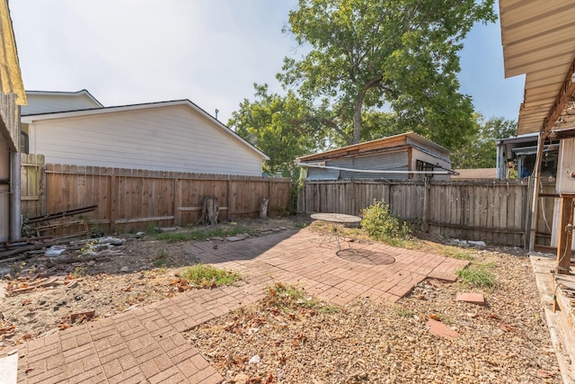2009 Chestnut St, Houston, TX 77009 - fenced backyard featuring a patio area