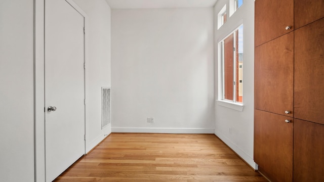 2436 Bissonnet St Unit 8, Houston, TX 77005 - unfurnished bedroom featuring light wood-style flooring and baseboards