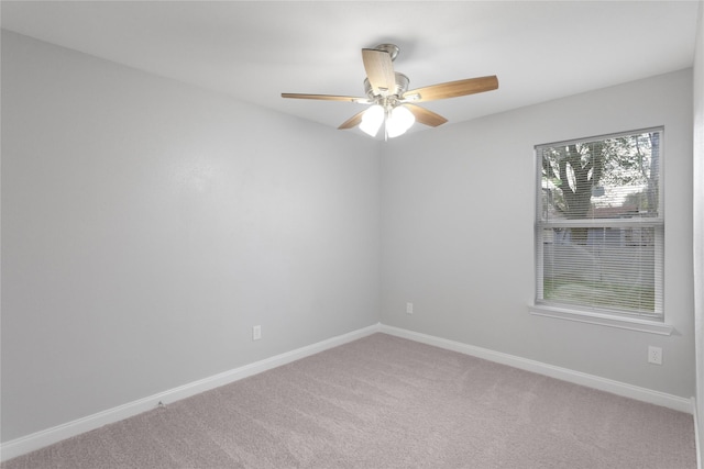 9827 Shive Dr, Houston, TX 77078 - spare room featuring carpet flooring, a ceiling fan, and baseboards
