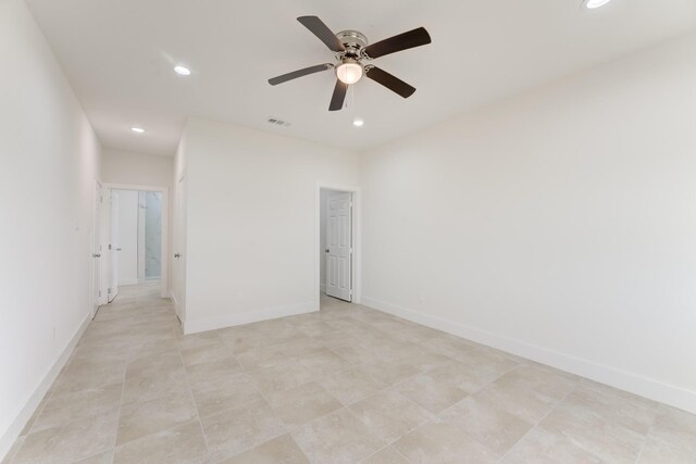 1189 County Road 5100, Cleveland, TX 77327 - empty room with recessed lighting, ceiling fan, and baseboards
