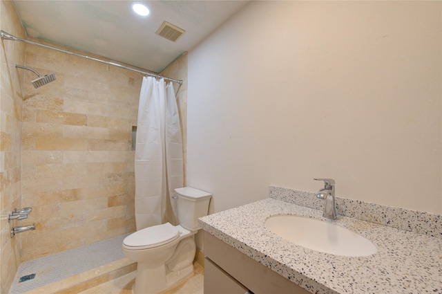 10102 Kirkvale Dr, Houston, TX 77089 - bathroom featuring a tile shower, toilet, recessed lighting, and vanity