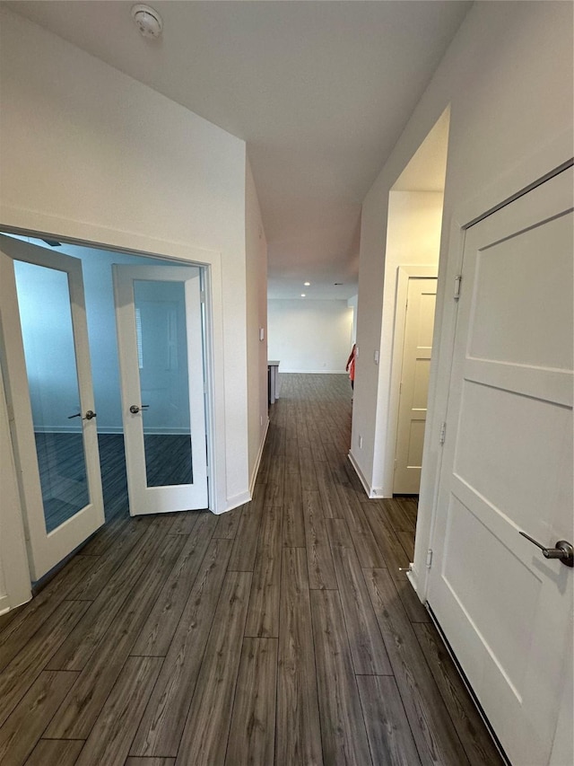 14007 Valley Creek Ct, Conroe, TX 77384 - corridor featuring dark wood-style floors, baseboards, and french doors