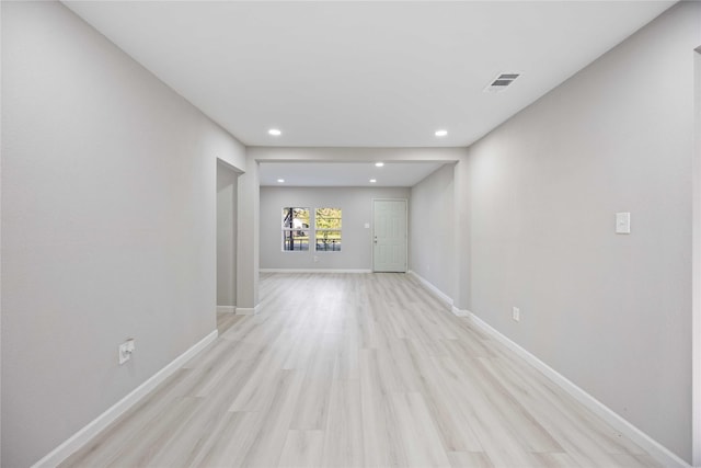 4114 Hoffman St, Houston, TX 77026 - spare room with baseboards, light wood finished floors, and recessed lighting