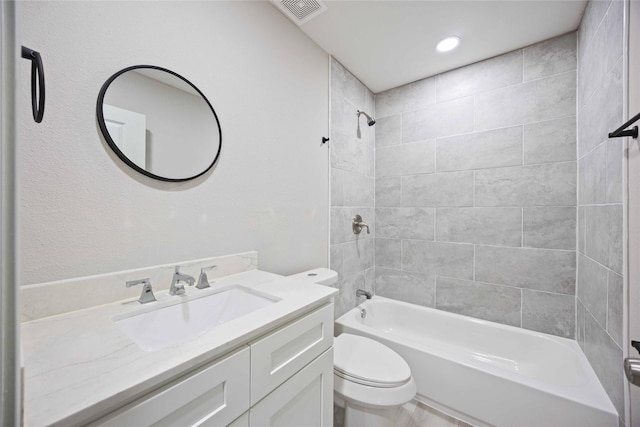 4114 Hoffman St, Houston, TX 77026 - bathroom with washtub / shower combination, toilet, and vanity