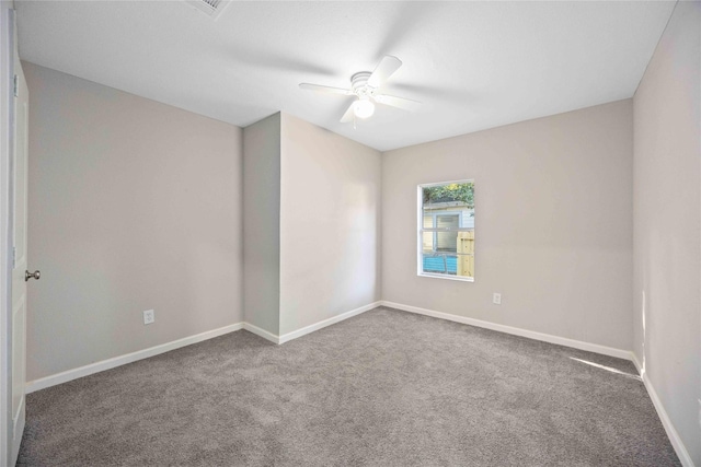 4114 Hoffman St, Houston, TX 77026 - empty room featuring carpet flooring, ceiling fan, and baseboards