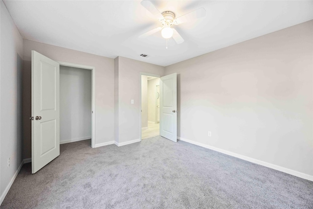 4114 Hoffman St, Houston, TX 77026 - unfurnished bedroom with carpet flooring, baseboards, and ceiling fan