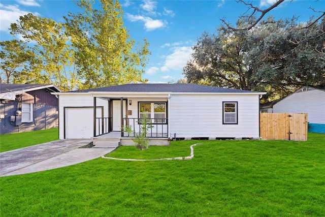 4114 Hoffman St, Houston, TX 77026 - view of front of house with an attached garage, driveway, a porch, and a shingled roof