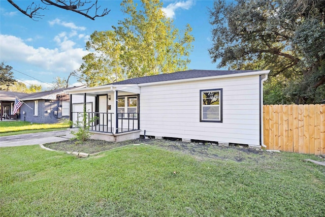 4114 Hoffman St, Houston, TX 77026 - view of front of home with an attached garage and concrete driveway
