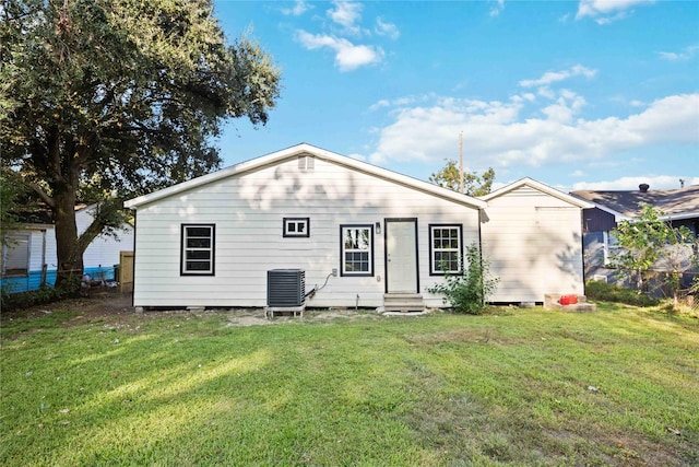 4114 Hoffman St, Houston, TX 77026 - back of house with central AC unit and entry steps