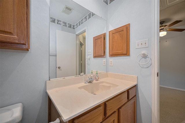 20011 Doherty Cir, Katy, TX 77449 - bathroom with a ceiling fan, vanity, and toilet
