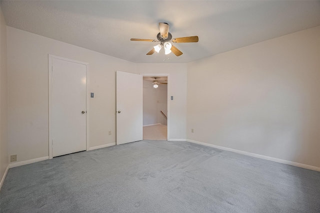 20011 Doherty Cir, Katy, TX 77449 - empty room featuring a ceiling fan, carpet floors, and baseboards